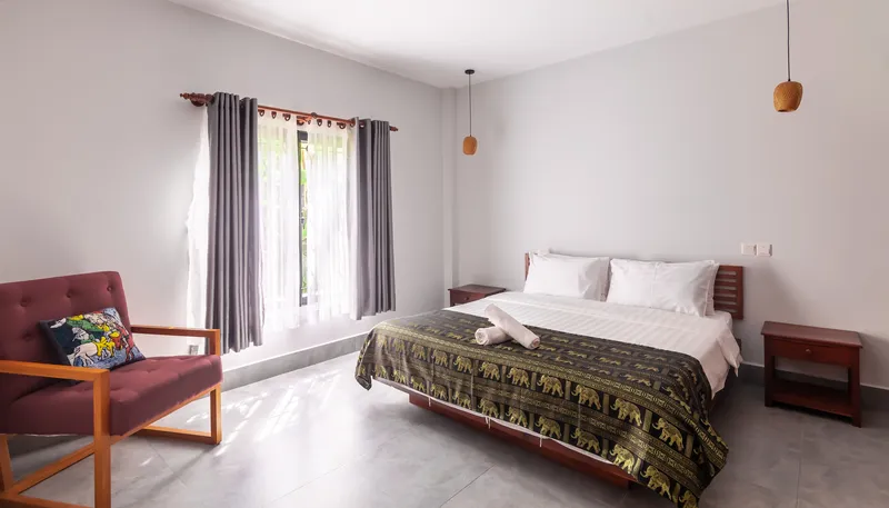 Villa bedroom with quality bedding
