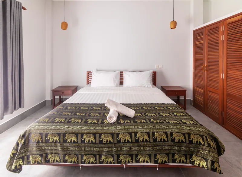 Villa bedroom with quality bedding