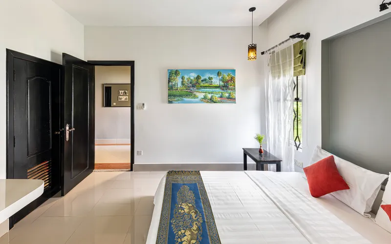 Villa bedroom with quality bedding